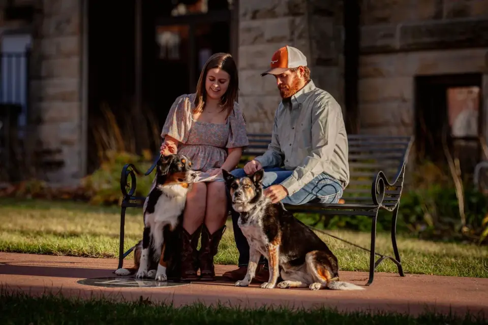A veterinarian and dog owner reviewing a supplement label together