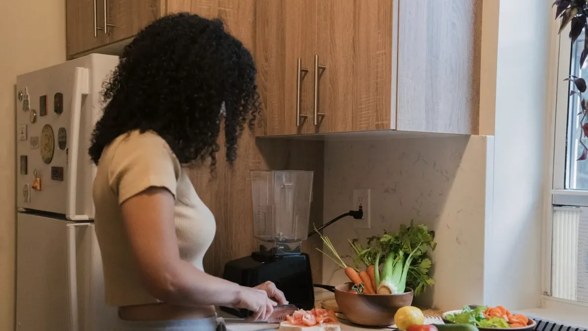 Dog owner preparing a meal