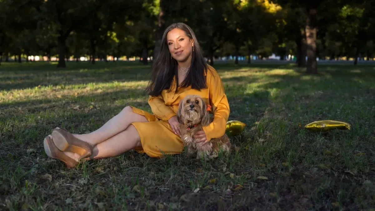 Older dog with an owner in a park